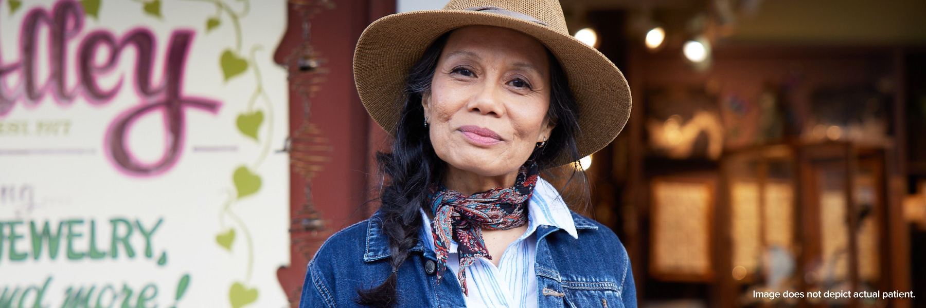 Patient portrait of woman in hat
